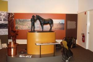 A bronze sculpture of R.M. Williams and horse