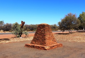 A monument to John McDowell Stuart beside the highway north from Alice Springs. Reminders of Stuart's explorations are scattered through the area  