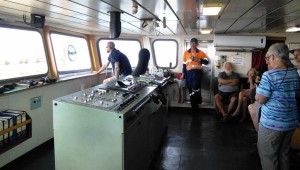 The control area on the bridge. The sailor in the chair is the duty officer.